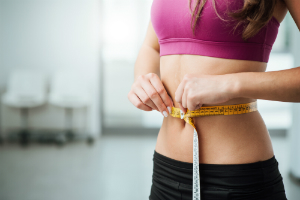 Are There Medical Benefits to a Tummy Tuck in Cedar Rapids?” width=
